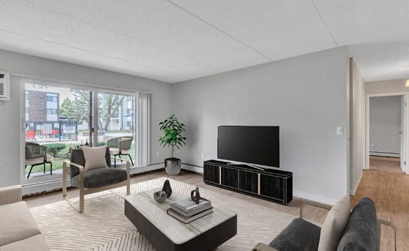 a living room with a couch and a tv