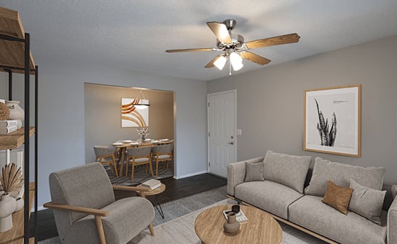 an open living room and dining room with a ceiling fan