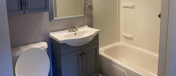 this is a photo of the bathroom in the 690 square foot 1 bedroom apartment at village
