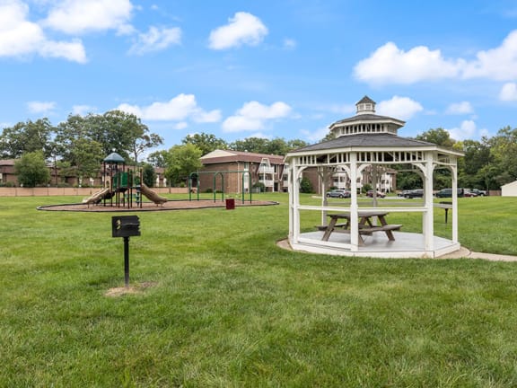 a park with a gazebo and a playground