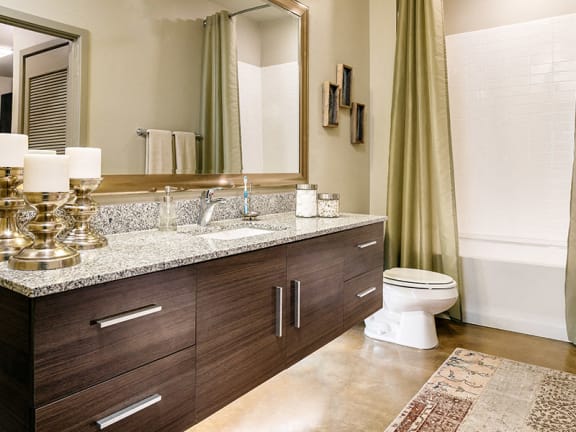 Model Bathroom with Floating Vanity at Dallas Apartment Near Oak Lawn