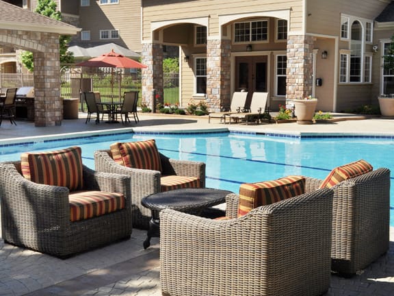 Resort-Style Swimming Pool and Sundeck Lounge at 80112 Apartments for Rent in Englewood