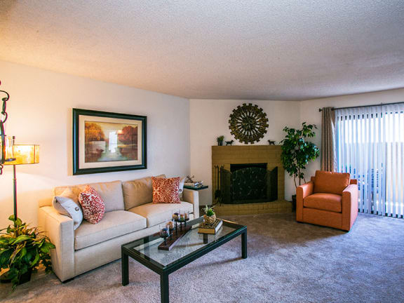 Spacious 1 and 2 Bedroom Apartments near Me with Carpet and Fireplace