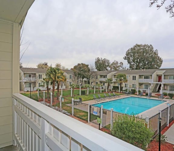 View of pool from balcony l Park Brentwood CA Apartments for rent