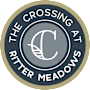 A logo with the text "The Crossing at Ritter Meadows" and a graphic of a leaf and a letter "C".