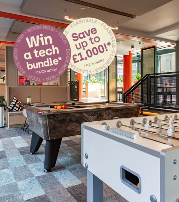 A sign in a room with tables and chairs advertises saving money.