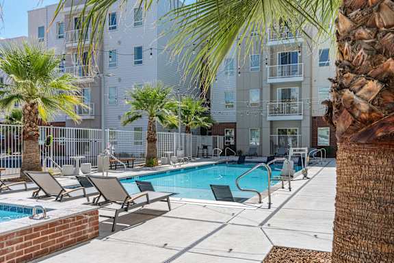 Modern Swimming Pool With Palm trees 605 Place Student Housing & Co-Living, St George, UT