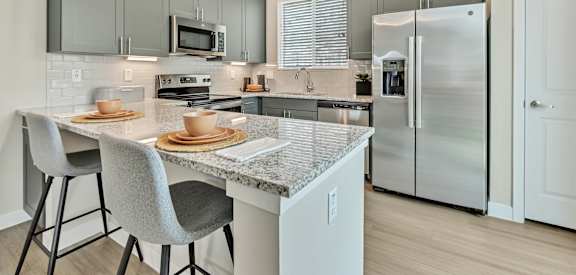 Gourmet Kitchen with Island at Avilla Towne Center, Princeton TX 75407