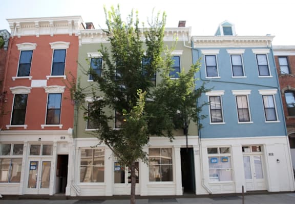 a row of colorful buildings on a city street