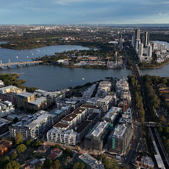 A cityscape with a river running through it.
