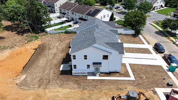 A house under construction in a residential area.