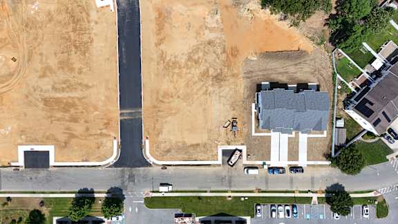 A construction site is visible from an aerial view.