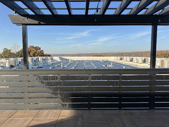 the view of the parking lot from the top of the building