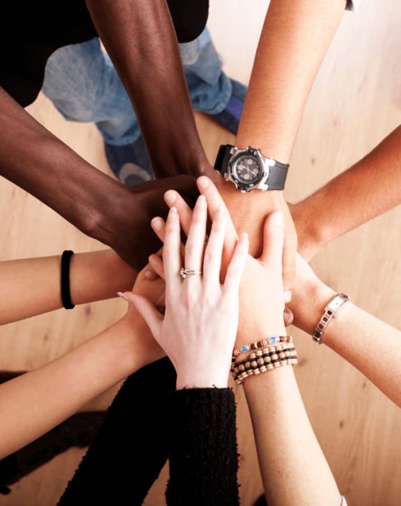 Hand of people coming together
