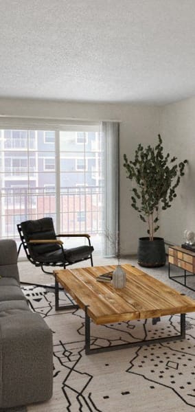 a living room with a couch and a coffee table and a tv