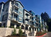 Thumbnail 2 of 31 - Building view at Commons at Sylvan Canyon Apartments, Portland, OR