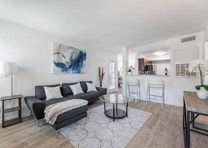 a living room with a couch and a coffee table