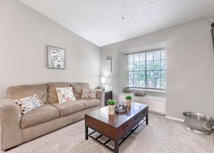 a living room with a couch and a coffee table