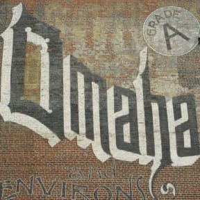 a mural on the side of a brick building
