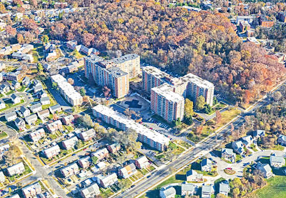 an aerial view of a city with buildings and trees at The Langston Views, Washington, DC, 20020