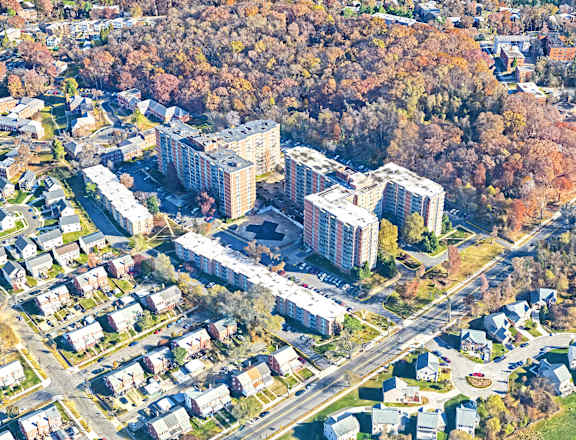 an aerial view of a city with buildings and trees at The Langston Views, Washington, Washington