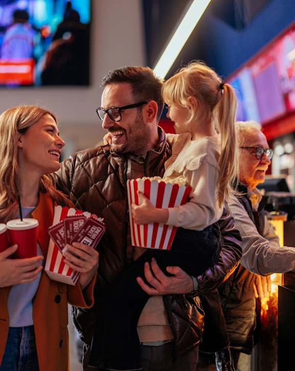 A family is enjoying a meal together at a fast food restaurant.