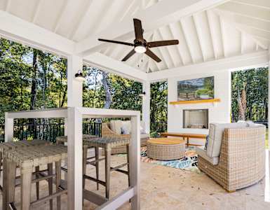 White Covered Patio with Fireplace at Park Circle Village Apartments, North Charleston, South Carolina
