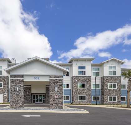 A large building with the number 302 on it.