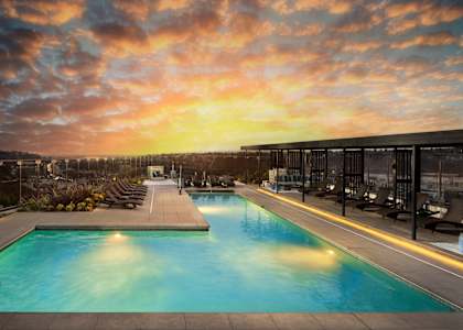 Pool at dusk at Chromatic Flats Apartments in San Diego CA