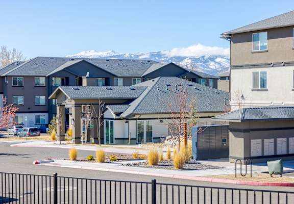 A row of houses with a mountain in the background at Springview by Vintage, Reno, 89512