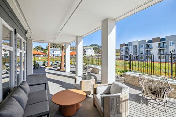 a living room with couches and a coffee table on a balconyat 38° NORTH, Santa Rosa, 95404