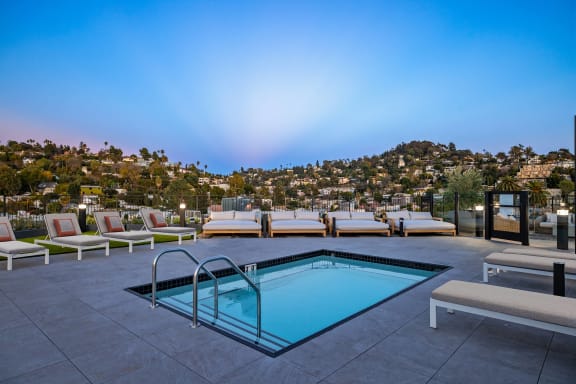 the pool on the rooftop of the hillside apartments at the ace hotel