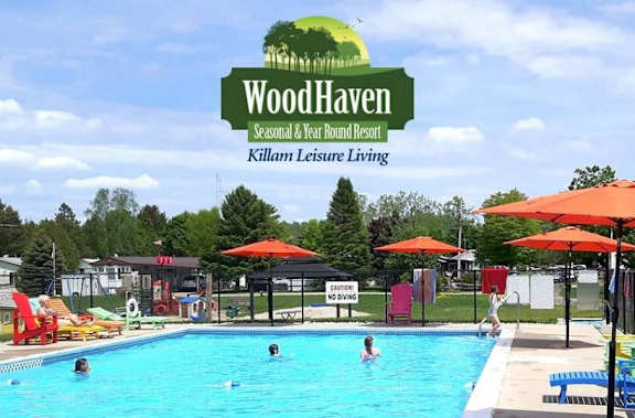 A pool at WoodHaven Seasonal & Year Round Resort.