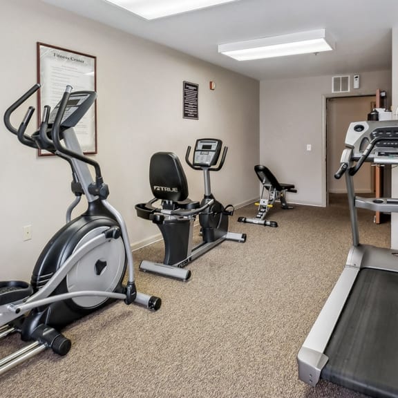 Fitness center at the woods at victoria park apartments