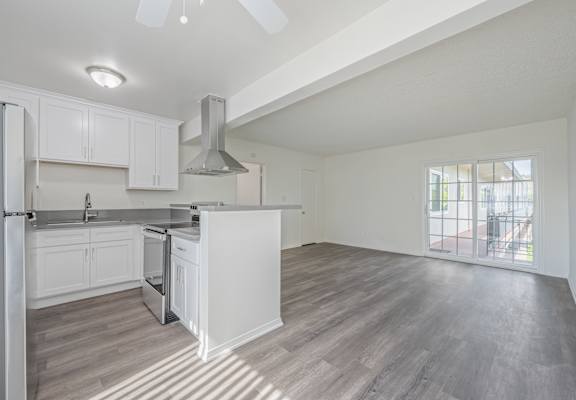 a kitchen and living room in a coronado home