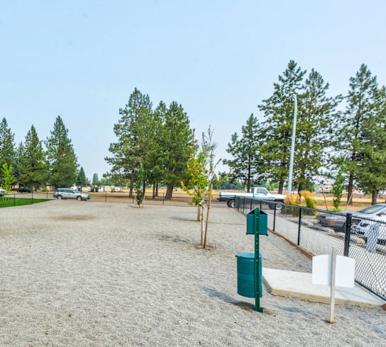 the park has a volleyball court and a picnic bench