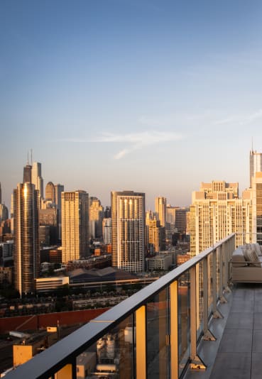 a balcony with a view of the city