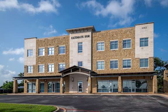 A large building with the words "ULTIMATE EOD" on the top.