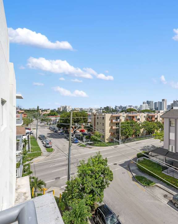 A view of a city street from a high vantage point.