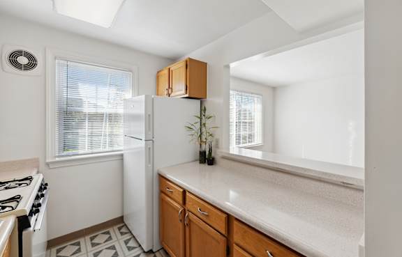 Kitchen with white counters at Patrick Henry Apartments Arlington VA