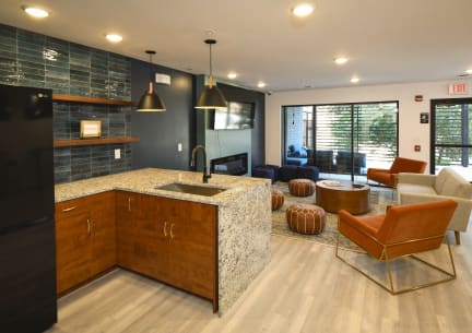 a room with two desks and two chairs