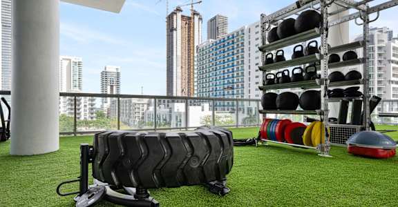 a gym with a view of the city