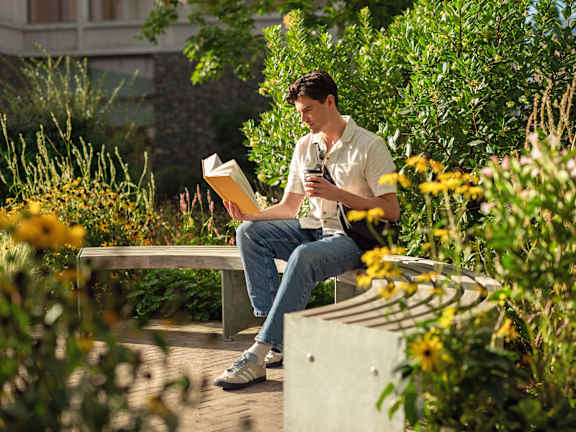 Man reading in Claremont Park