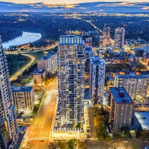 an aerial view of the building at dusk at Citizen on Jasper, Edmonton, Alberta, T5K 0P3