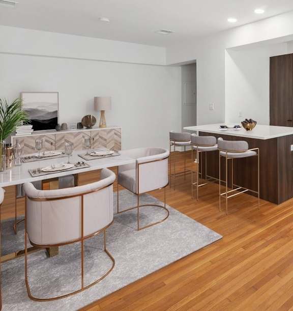 a kitchen with a stove top oven next to a sink
