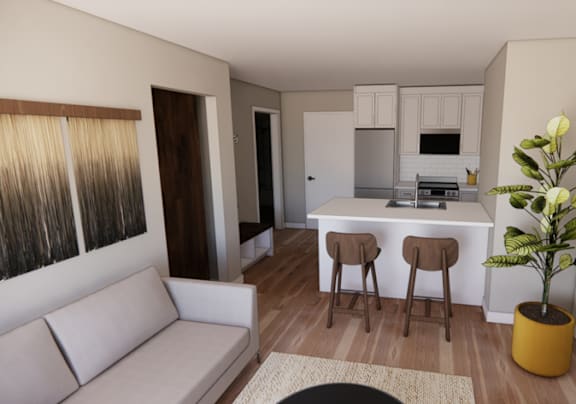 A living room with a couch, a table, and a plant.