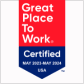 a red white and blue sign that says great place to work