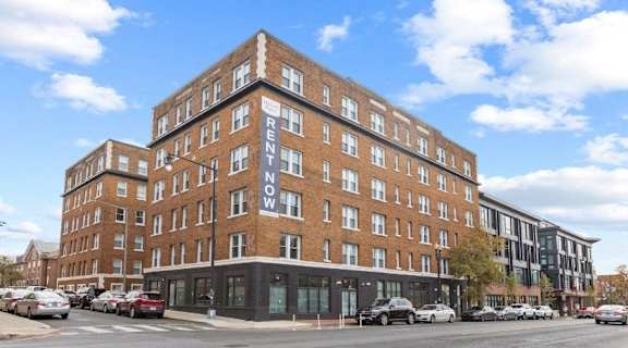 an apartment building on the corner of a city street at Howard Manor, Washington, DC