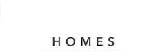 The image is a logo for Wallick Communities, featuring a wheelchair and a house.
