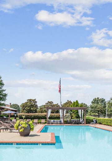 The large swimming pool and sundeck at Centerville Manor Apartments in Virginia Beach, VA